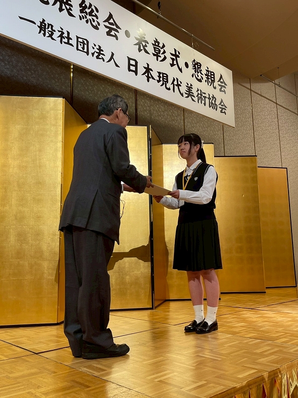 入選